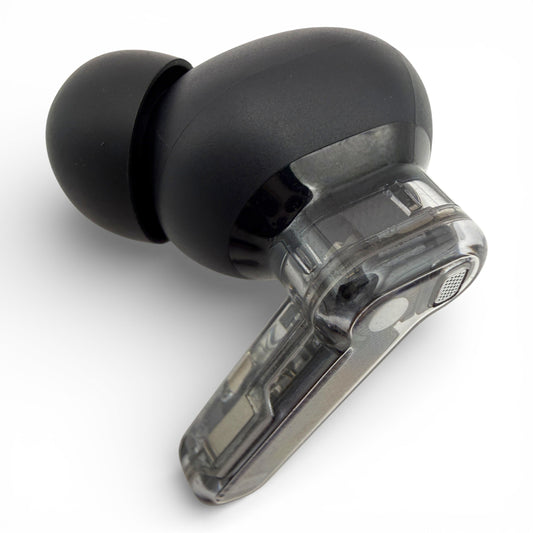 Left Nothing ear earbud in black, front view showing the ear tip and transparent stem with charging contacts