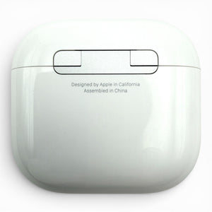 Apple AirPods 4 replacement charging case, back view showing Designed by Apple text and status light