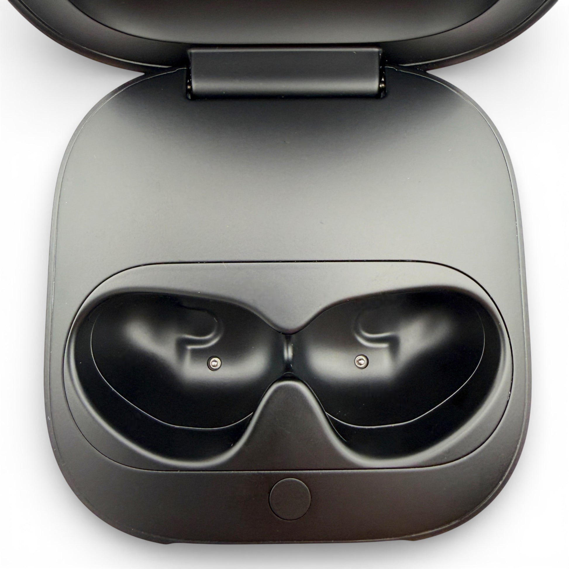 Beats Fit Pro charging case in black, open showing the earbud charging cradles