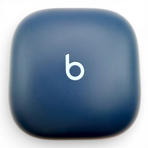 Beats Fit Pro charging case in blue, front view showing the Beats logo