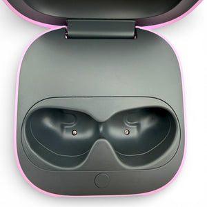 Beats Fit Pro charging case in purple, open showing the earbud charging cradles