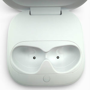 Beats Fit Pro charging case in white, open showing the earbud charging cradles