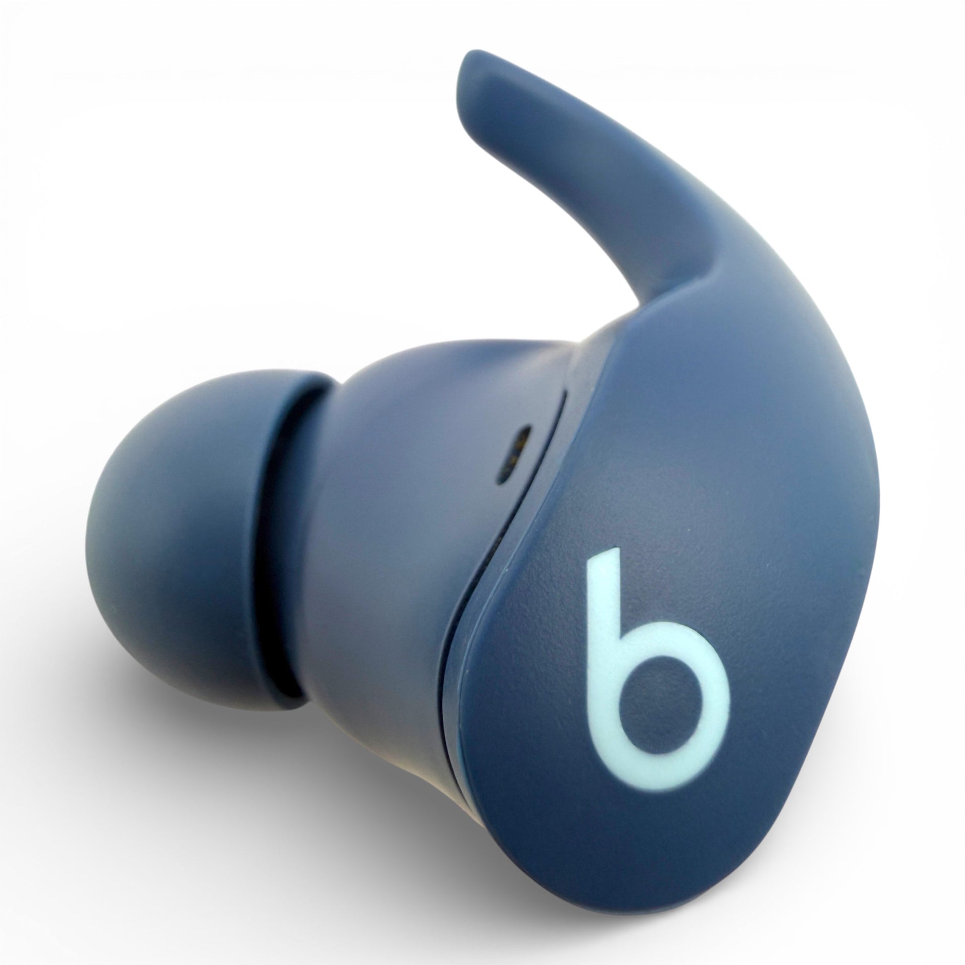 Left replacement Beats Fit Pro earbud in blue, front view showing the Beats logo and ear tip