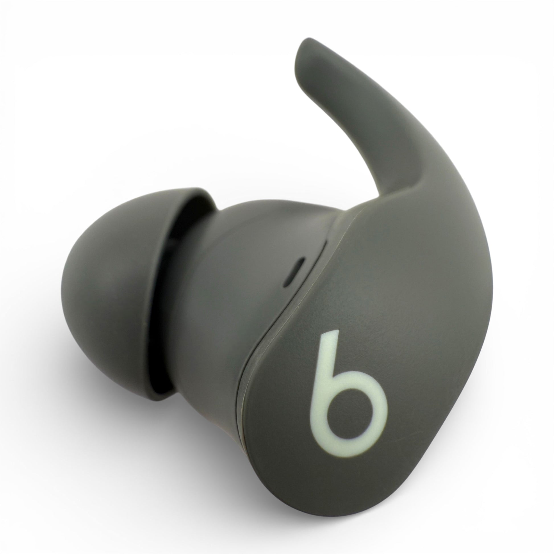 Left replacement Beats Fit Pro earbud in gray, front view showing the Beats logo and ear tip