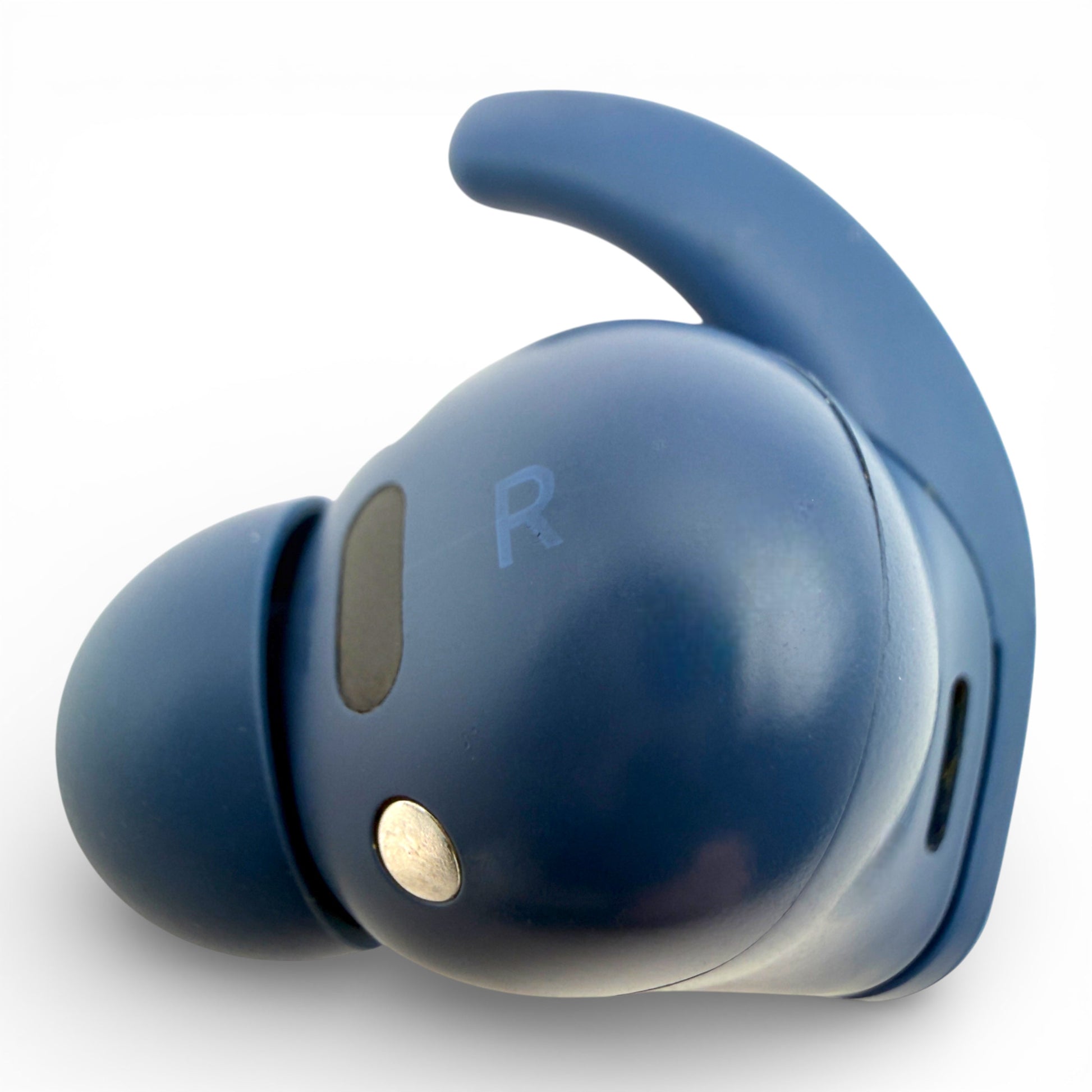 Right replacement Beats Fit Pro earbud in blue, back view showing the R marking and charging contact