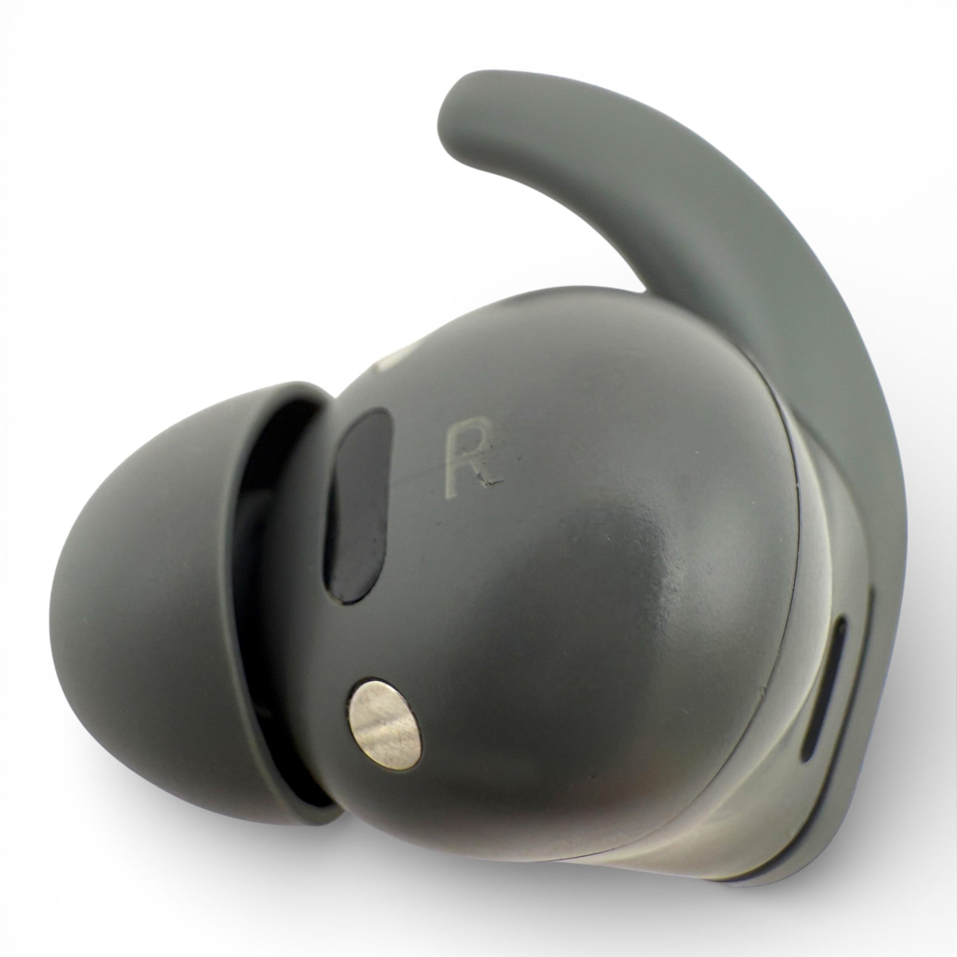 Right replacement Beats Fit Pro earbud in gray, back view showing the R marking and charging contact