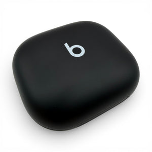 Beats Powerbeats Fit charging case in black, angled view of the closed lid
