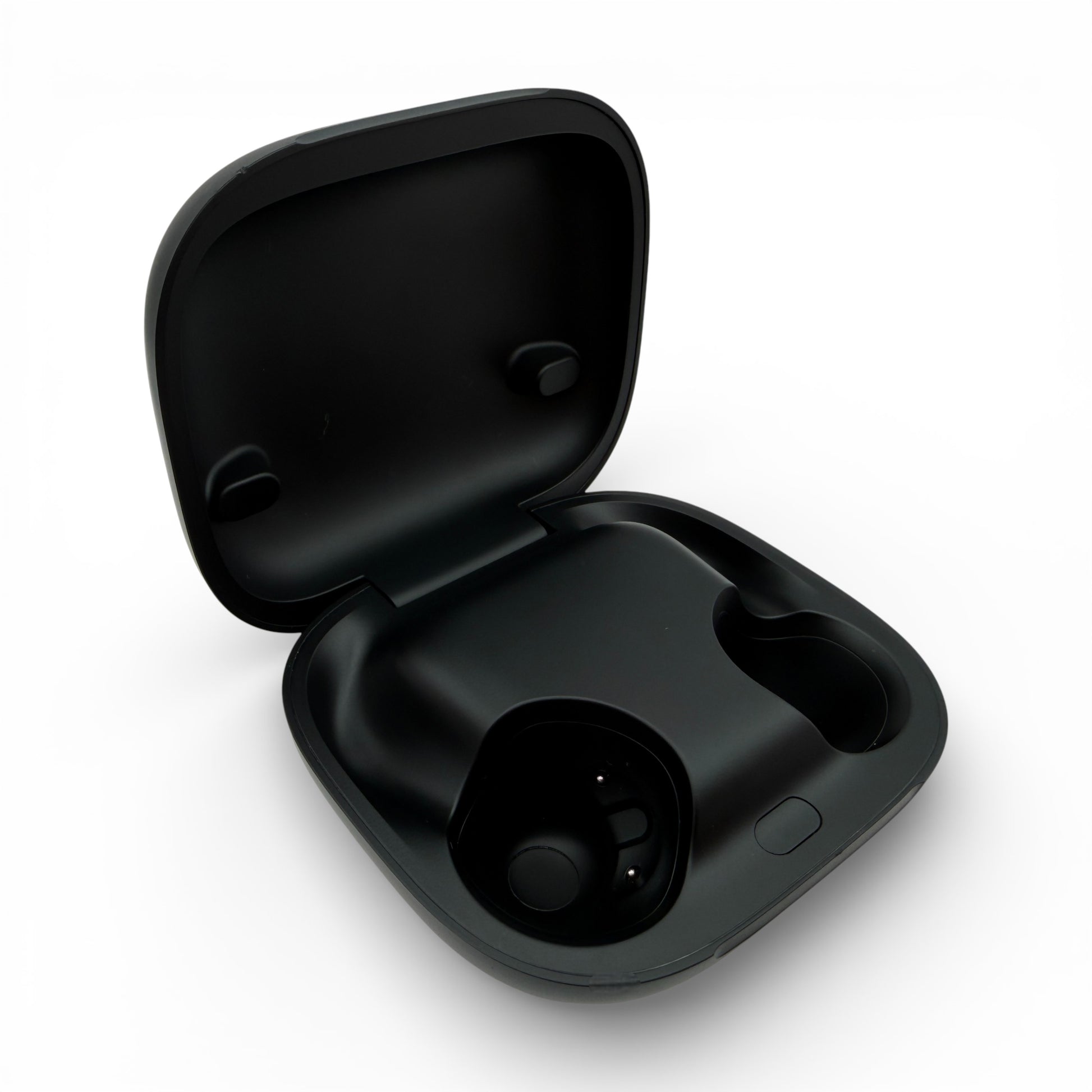 Beats Powerbeats Pro 2 charging case in black, opened to reveal the earbud charging slots