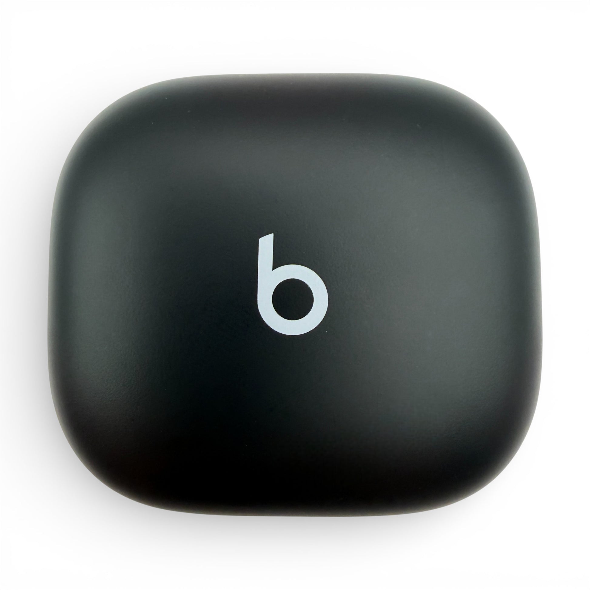 Beats Powerbeats Pro 2 charging case in black, top-down view of the closed lid