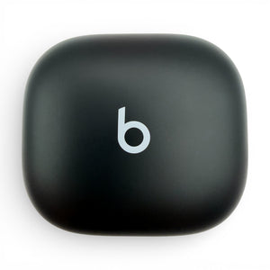 Beats Powerbeats Pro 2 charging case in black, top-down view of the closed lid