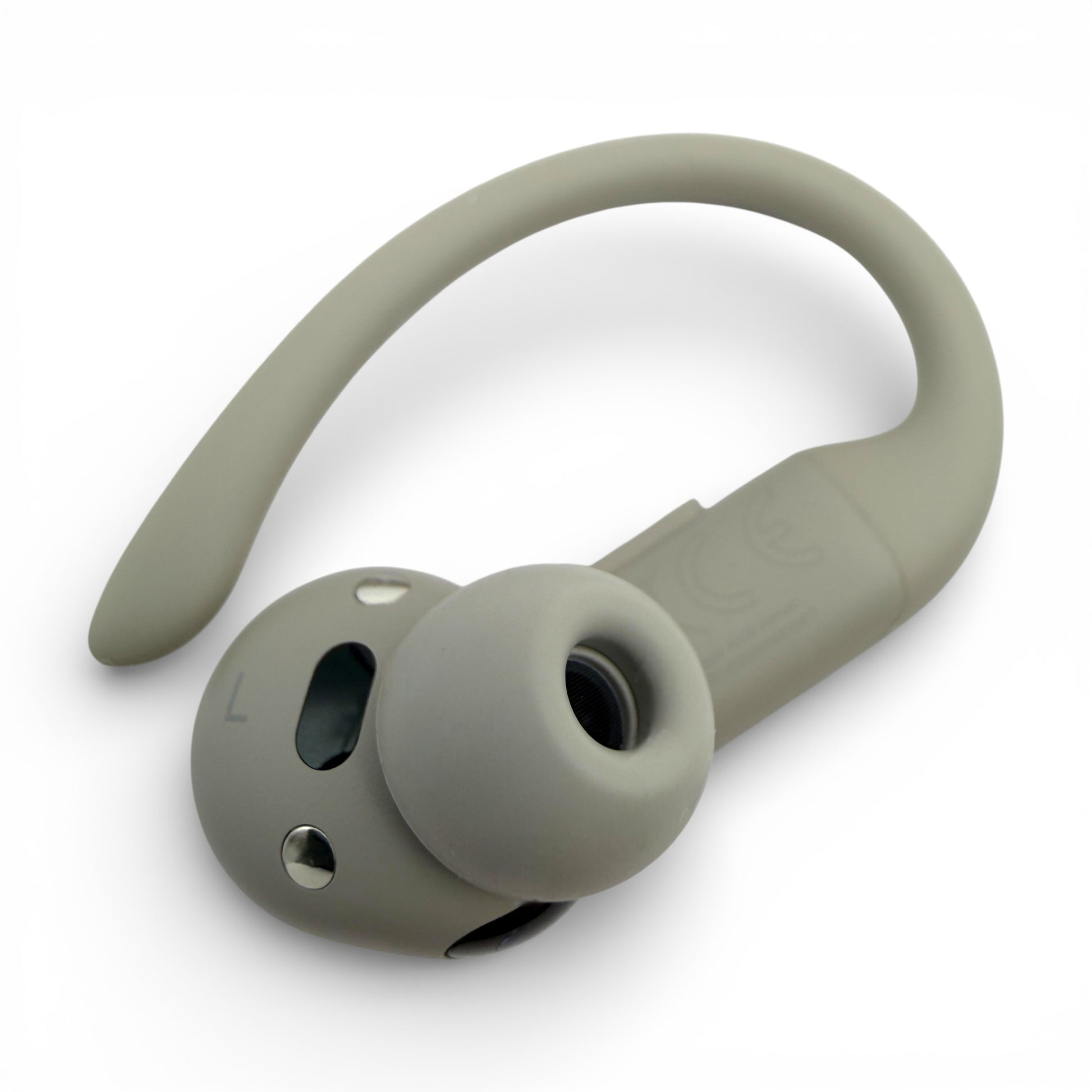 Left replacement Powerbeats Pro 2 earbud in gray, back view showing the L label and charging contacts