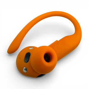 Left replacement Powerbeats Pro 2 earbud in orange, back view showing the L label and charging contacts