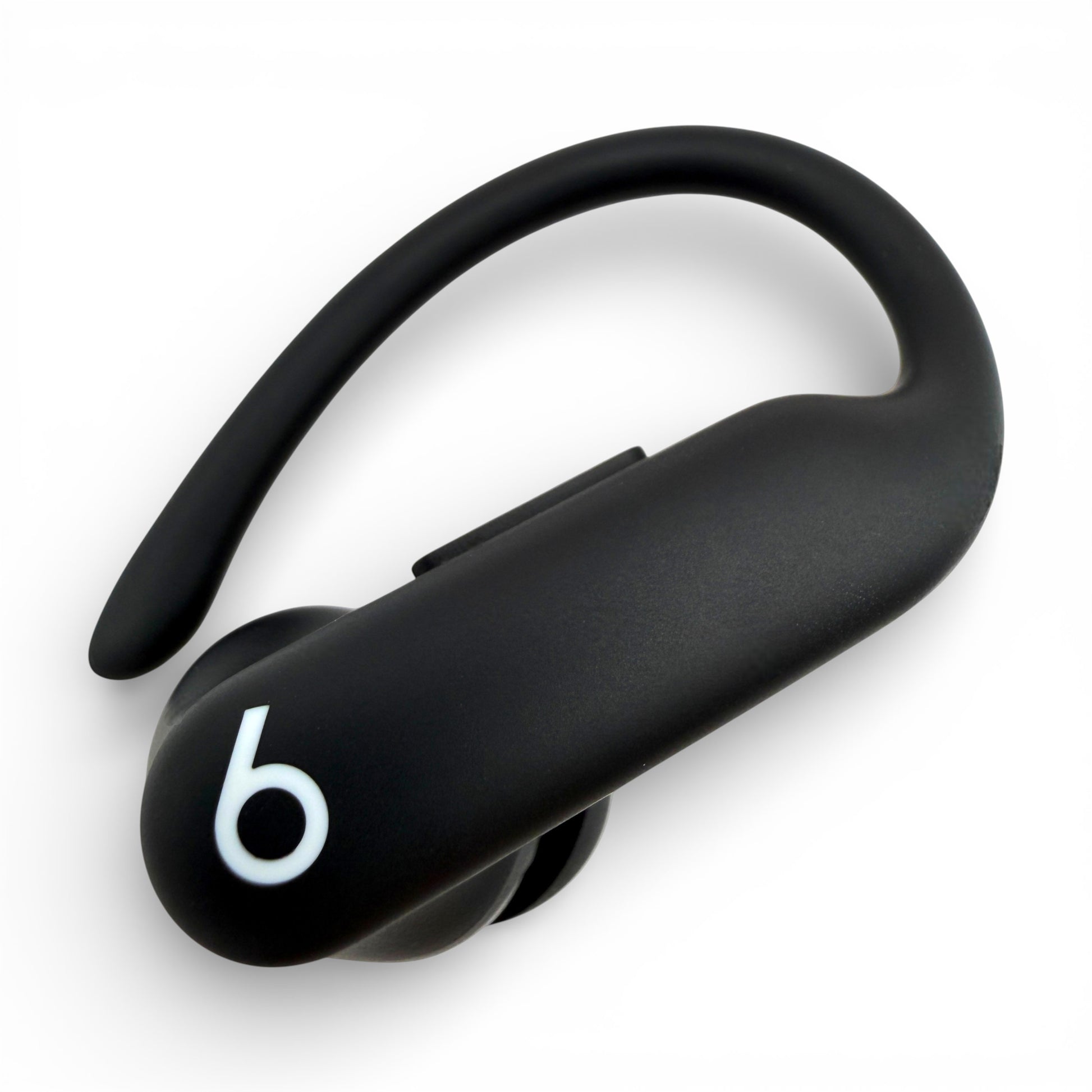 Right replacement Powerbeats Pro 2 earbud in black, close-up front view of housing and logo