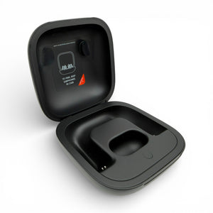 Powerbeats Pro charging case in black, open showing earbud slots and charging pins
