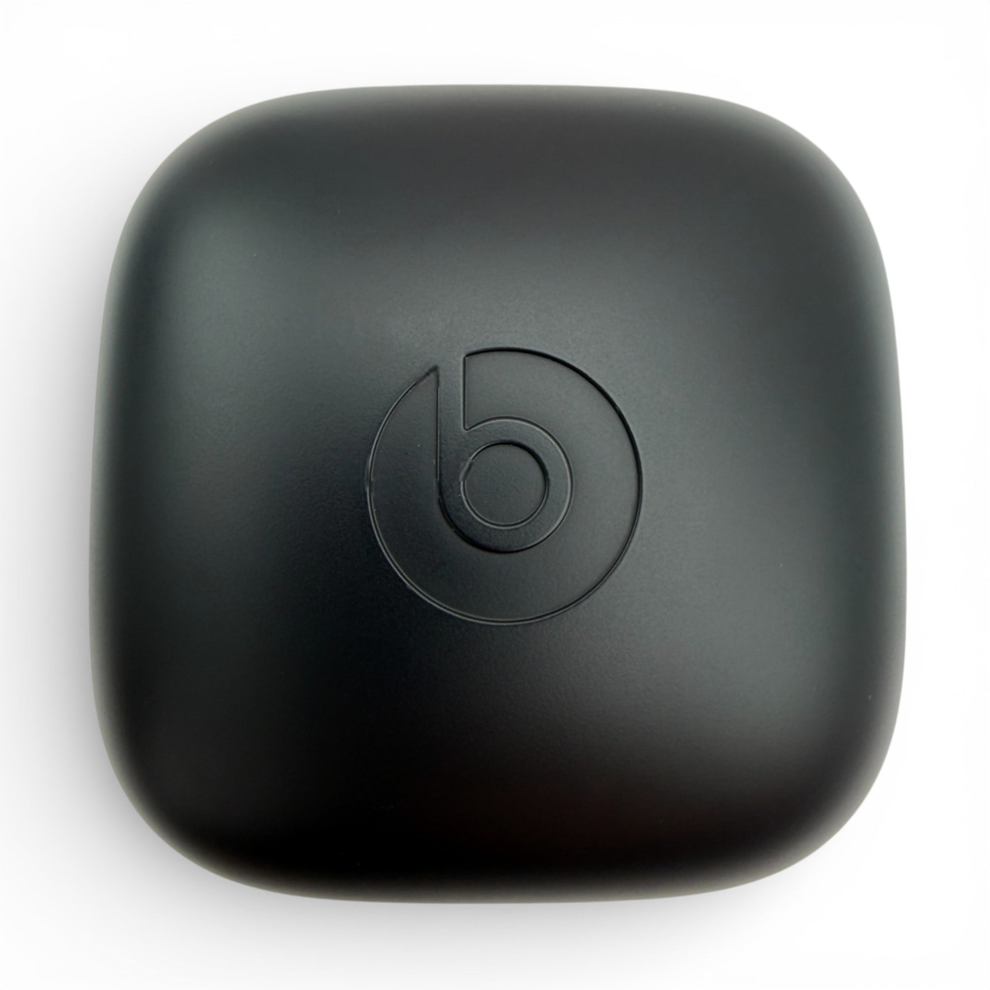 Powerbeats Pro replacement charging case in black, top-down view with beats logo