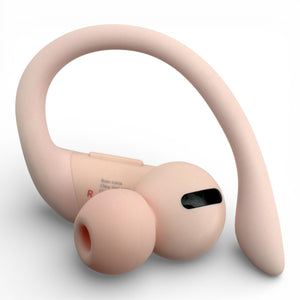 Right replacement Powerbeats Pro earbud in pink, side view with ear tip attached