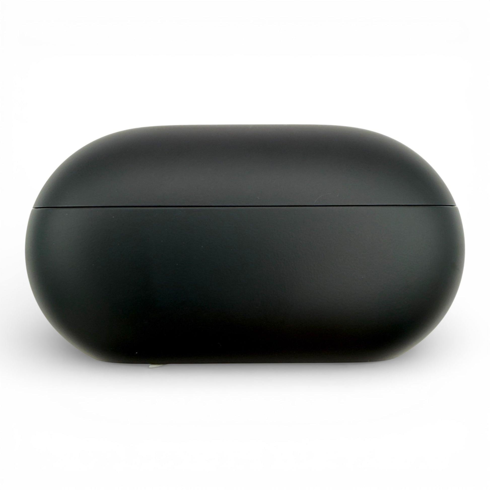 Beats Solo Buds charging case in black, side view of the closed case showing the seam