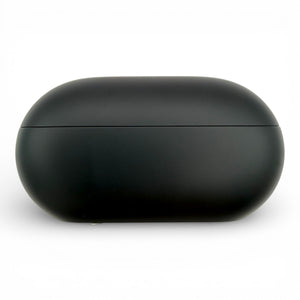 Beats Solo Buds charging case in black, side view of the closed case showing the seam