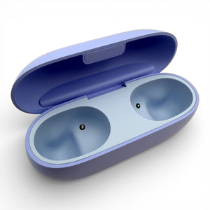 Beats Solo Buds charging case in purple, open showing the two empty earbud charging bays