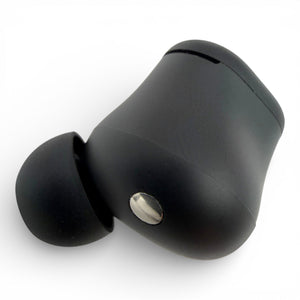 Left replacement Beats Solo Buds earbud in black, back view showing the charging contact and ear tip