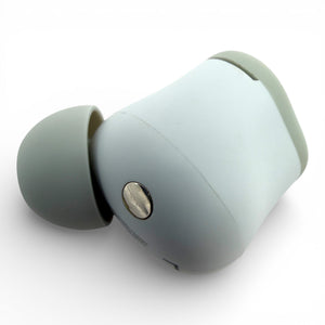 Left replacement Beats Solo Buds earbud in gray, back view showing the charging contact and ear tip