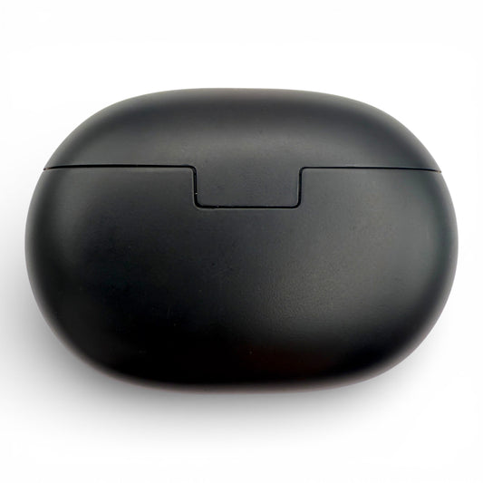 Beats Studio Buds charging case in black, back view showing the hinge seam