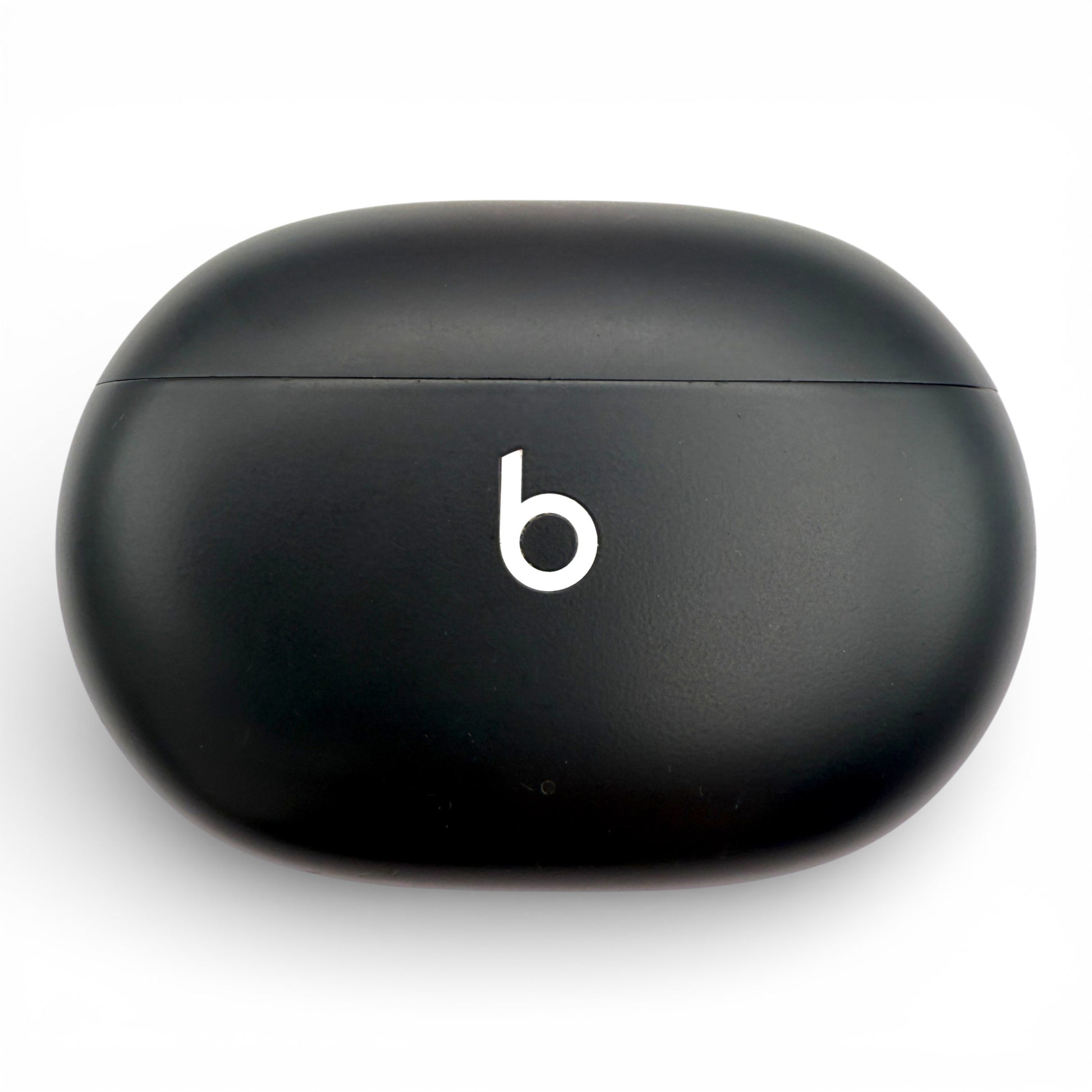 Beats Studio Buds replacement charging case in black, closed front view with logo