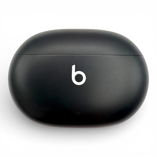 Beats Studio Buds replacement charging case in black, closed front view with logo