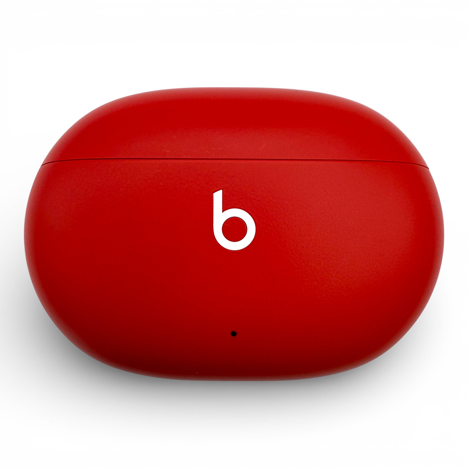 Beats Studio Buds charging case in red, closed front view with logo