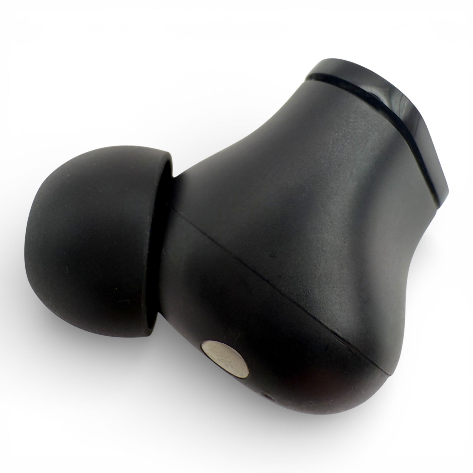 Left replacement Beats Studio Buds earbud in black, back view showing the charging contact and ear tip