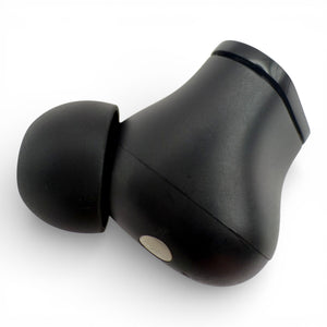 Left replacement Beats Studio Buds earbud in black, back view showing the charging contact and ear tip