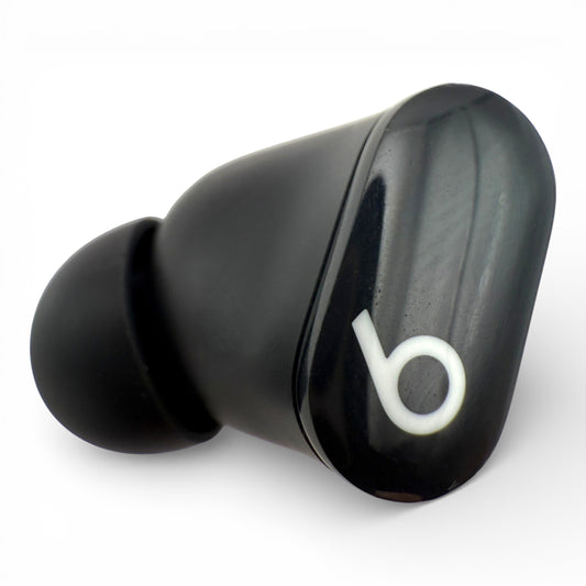 Left replacement Beats Studio Buds earbud in black, glossy front view showing the logo and ear tip