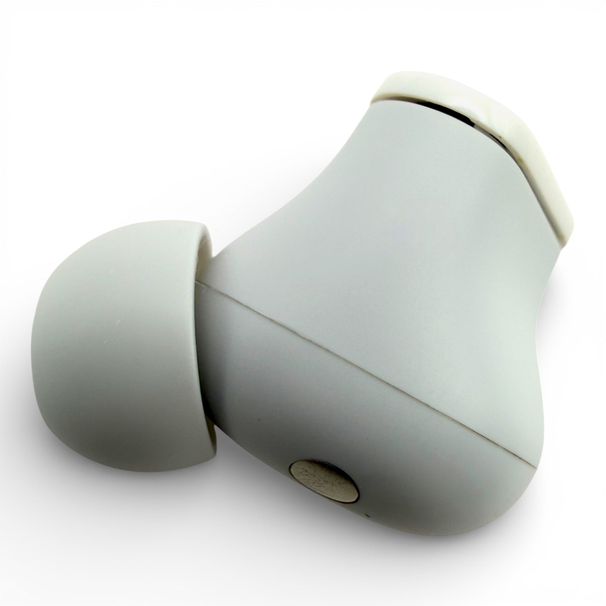 Left replacement Beats Studio Buds earbud in white, back view showing the charging contact and ear tip