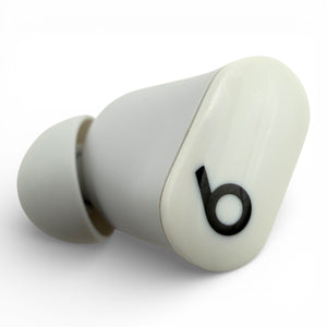 Left replacement Beats Studio Buds earbud in white, front view showing the logo and ear tip