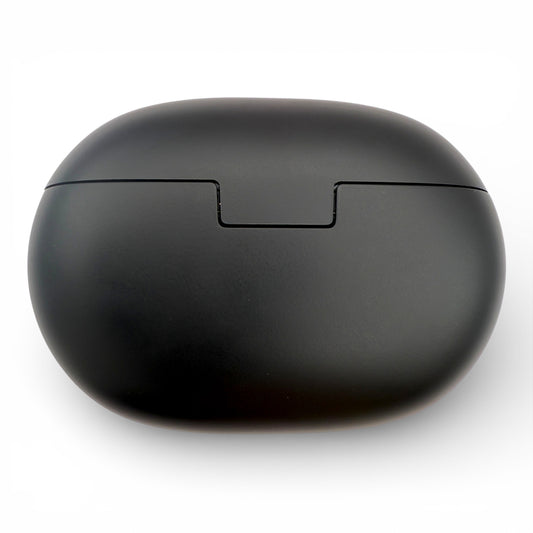 Beats Studio Buds+ charging case in black, closed back view showing the opening notch