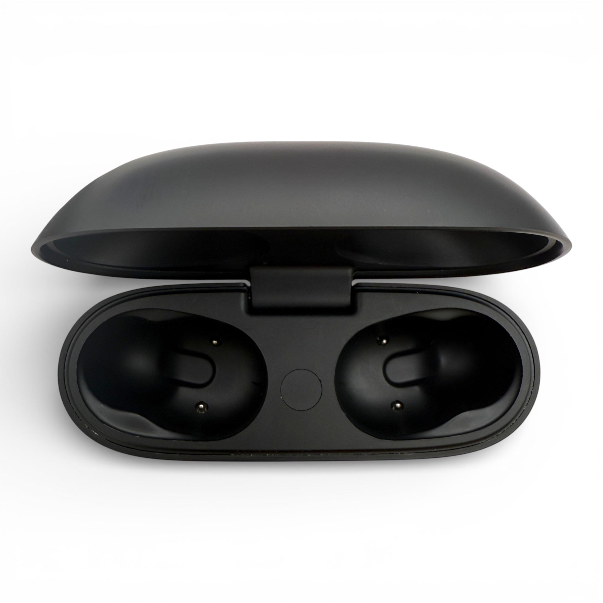 Beats Studio Buds+ charging case in black, open lid revealing two empty earbud slots