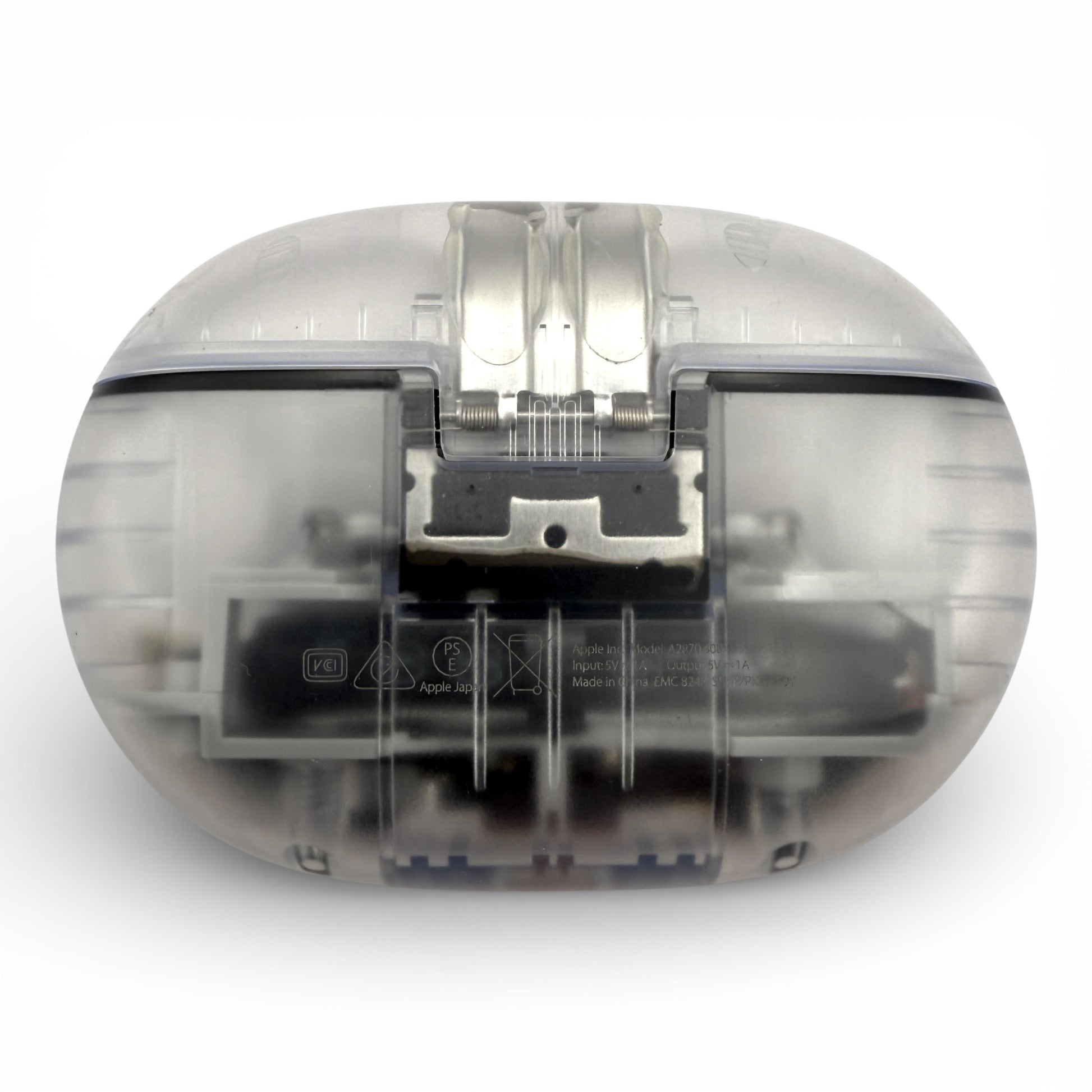 Beats Studio Buds+ charging case in clear, closed back view showing the hinge through the shell
