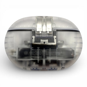 Beats Studio Buds+ charging case in clear, closed back view showing the hinge through the shell