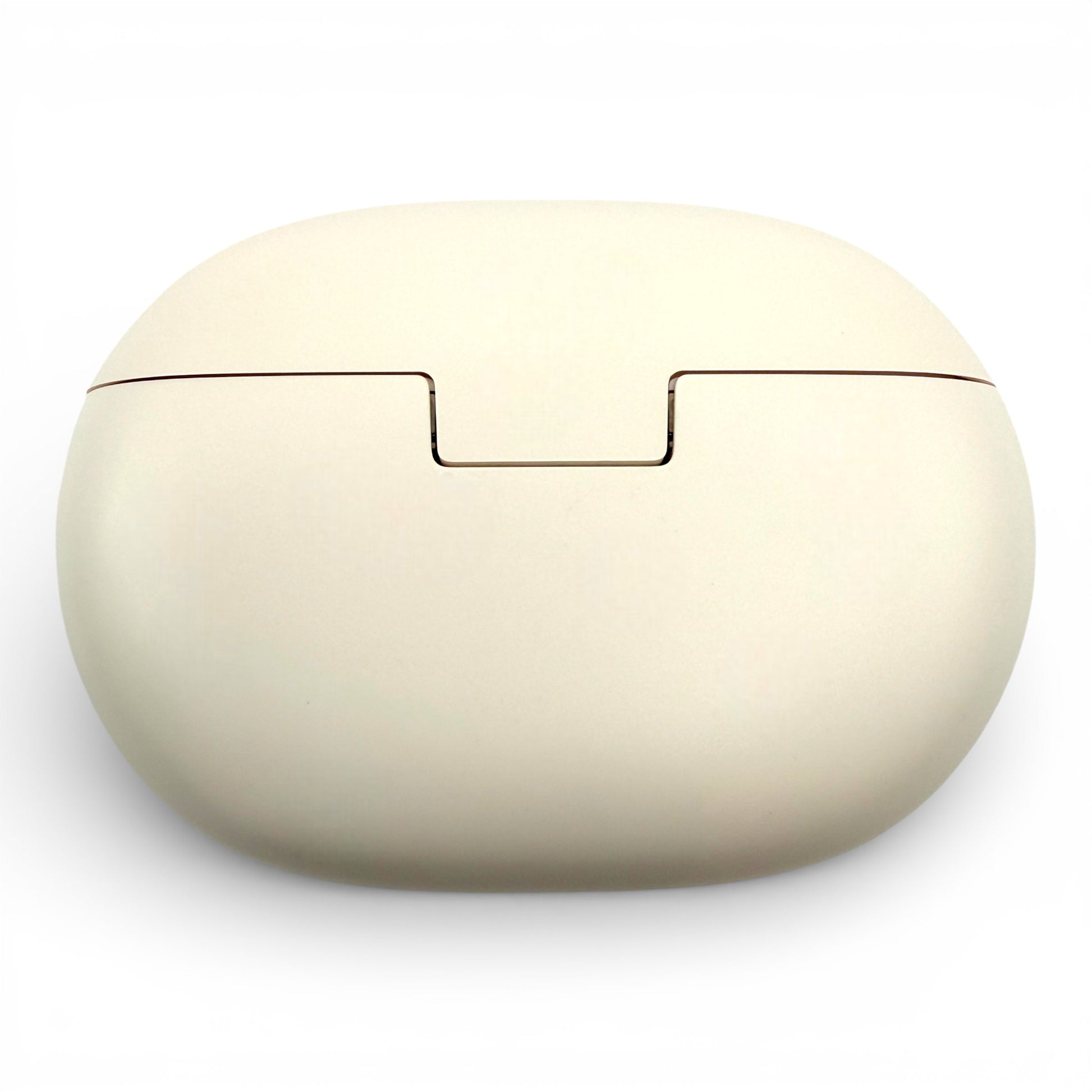 Beats Studio Buds+ charging case in ivory, closed back view showing the opening notch