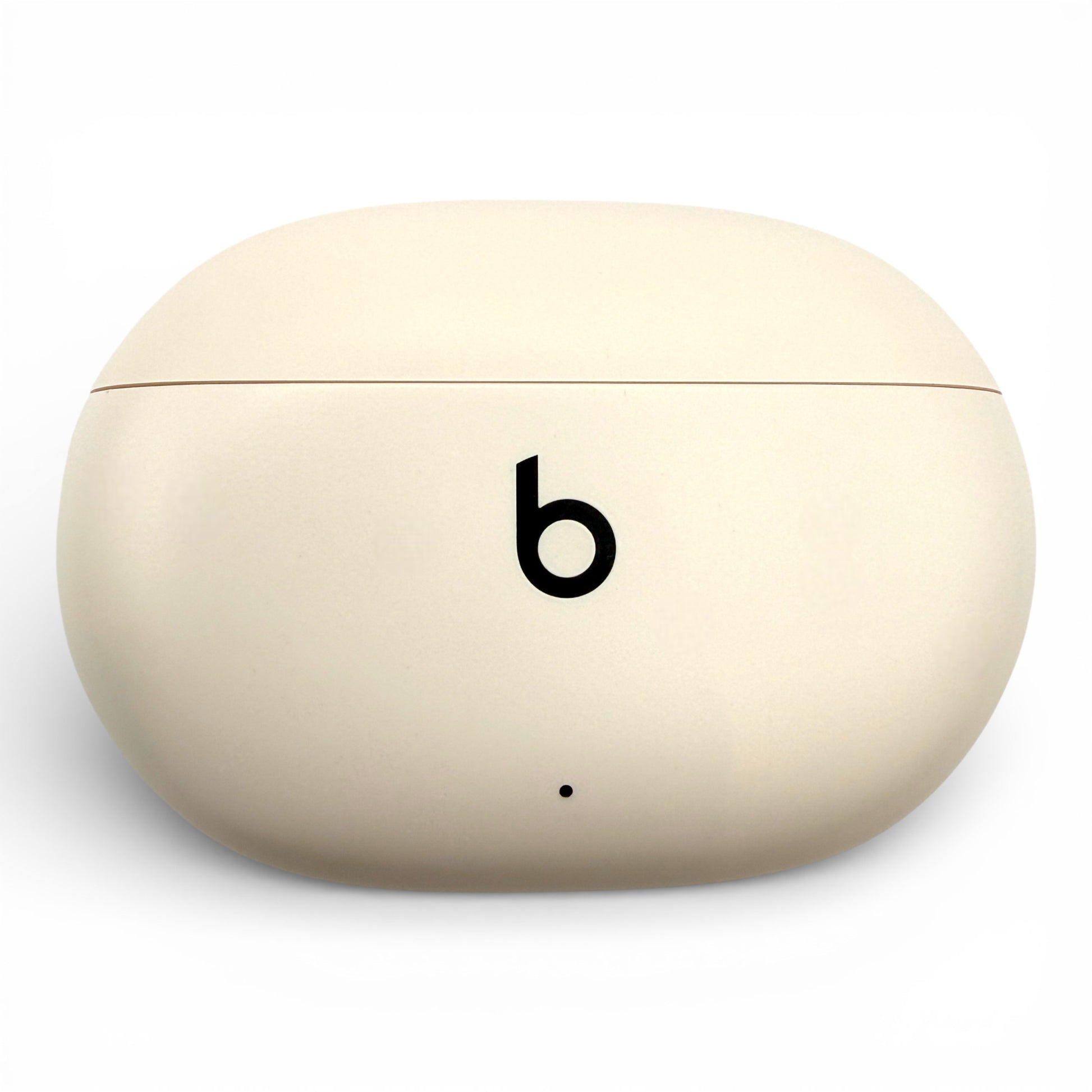 Beats Studio Buds+ charging case in ivory, closed front view showing the logo and LED indicator