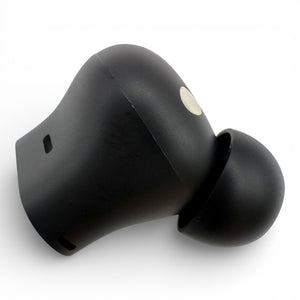 Left Beats Studio Buds+ earbud in black, side view showing the charging contact