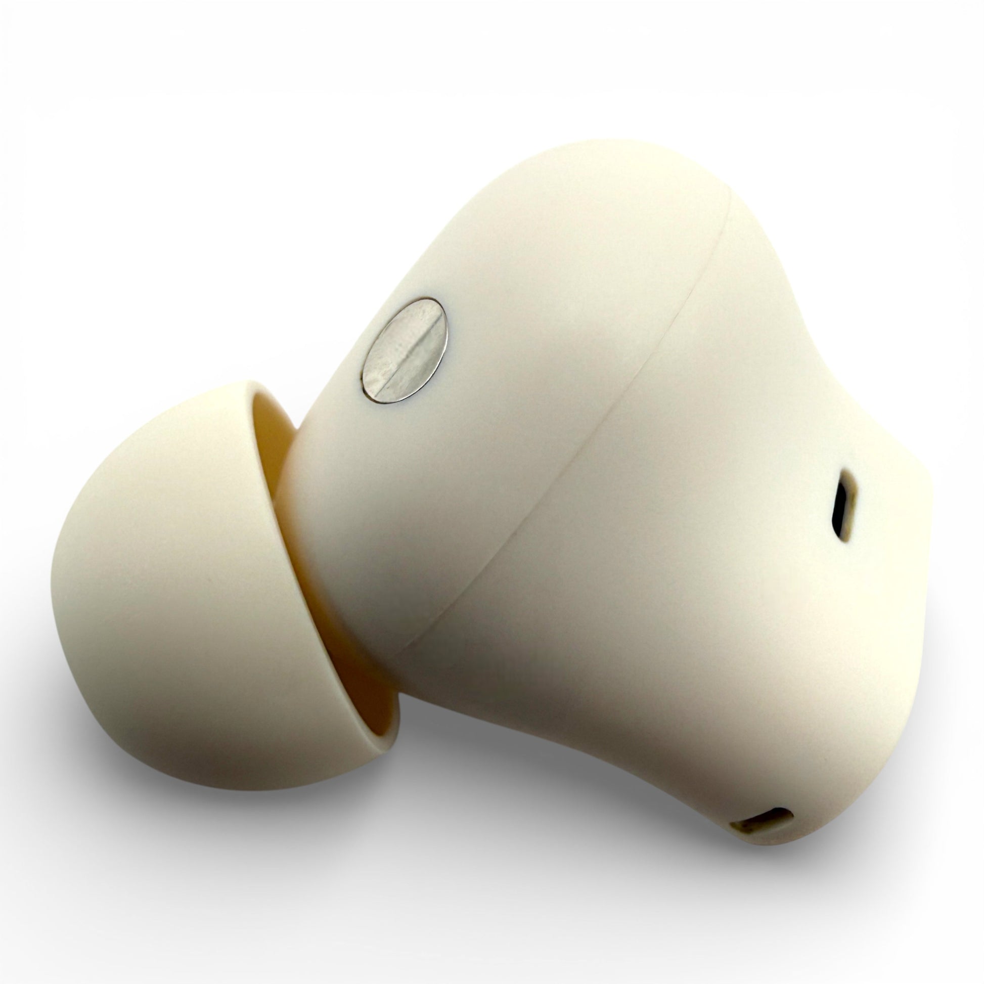 Right replacement Beats Studio Buds Plus earbud in ivory, side view showing the charging contact and ear tip
