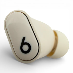 Right replacement Beats Studio Buds Plus earbud in ivory, top view showing the b logo and ear tip