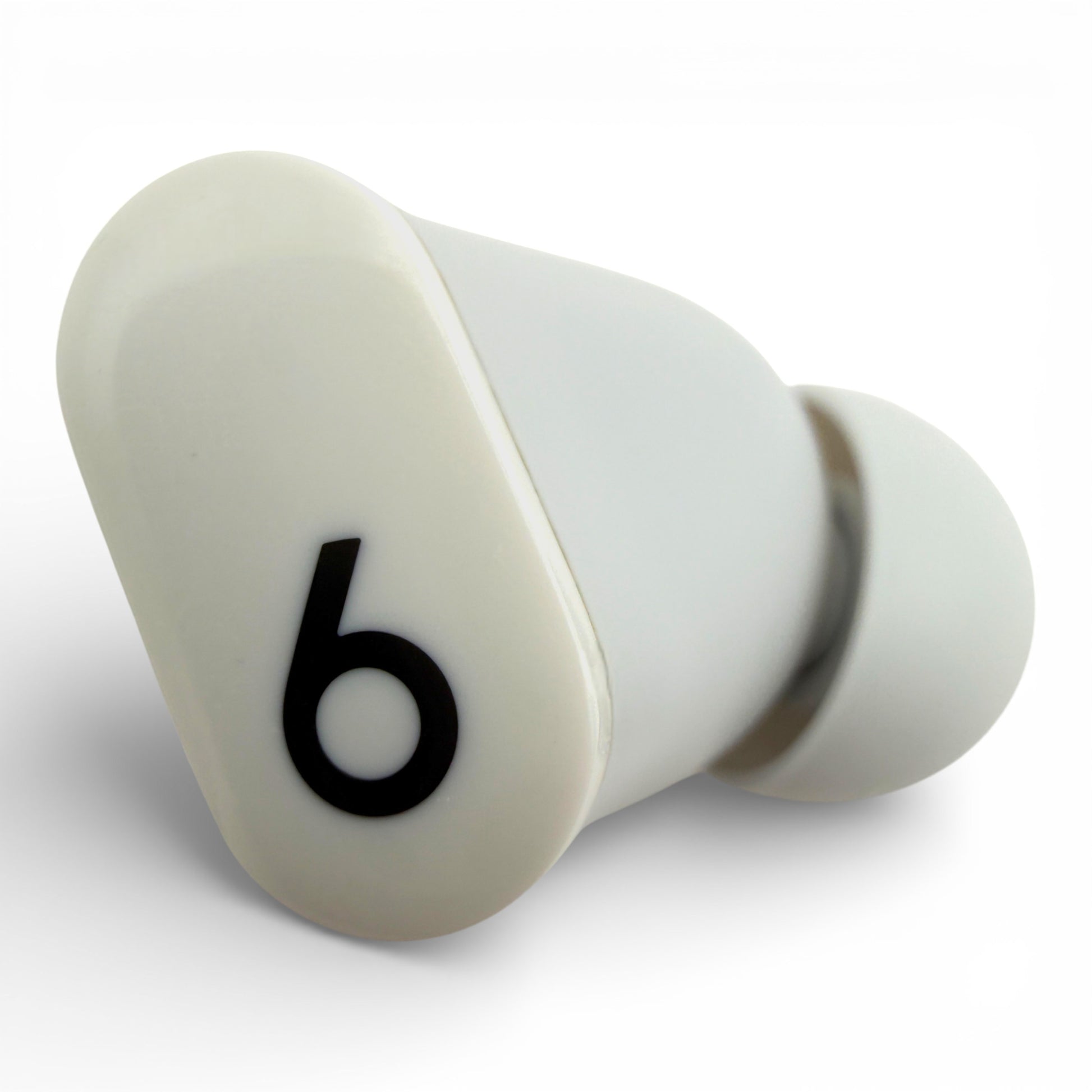 Right replacement Beats Studio Buds earbud in white, front view showing the glossy logo