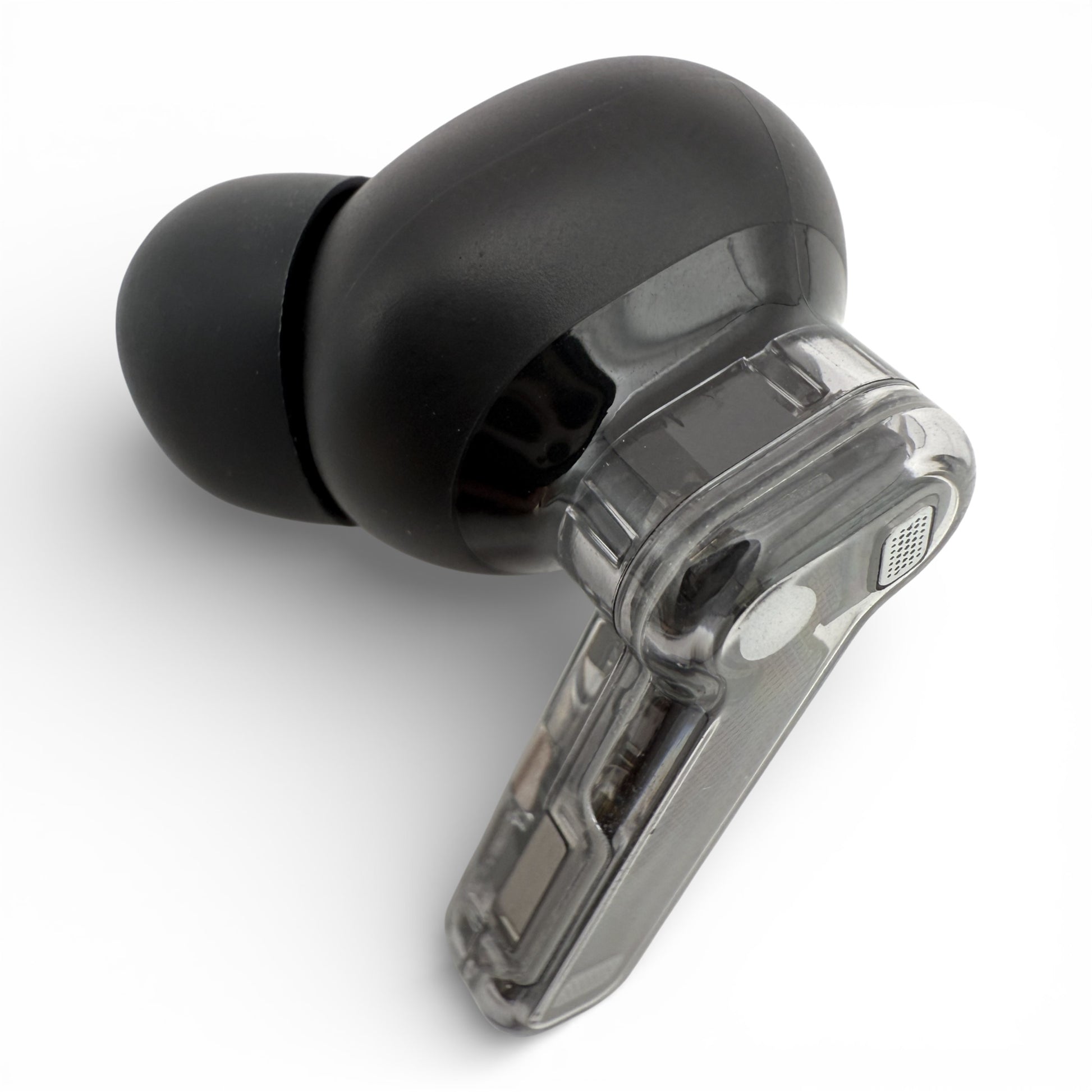 Left Nothing ear (2) earbud in black, front view showing the ear tip and transparent stem with charging contacts