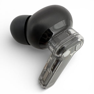 Left Nothing ear (2) earbud in black, front view showing the ear tip and transparent stem with charging contacts