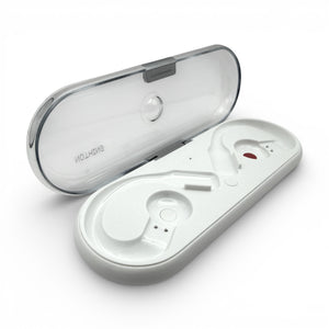 Nothing ear (open) charging case open, showing the earbud resting in the tray with charging pins