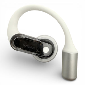 Left replacement Nothing ear (open) earbud, front view showing the NOTHING logo and clear module