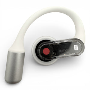 Right replacement Nothing ear (open) earbud, front view showing control panel and charging pin