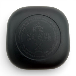 Samsung Galaxy Buds2 Pro charging case in black, underside showing regulatory markings